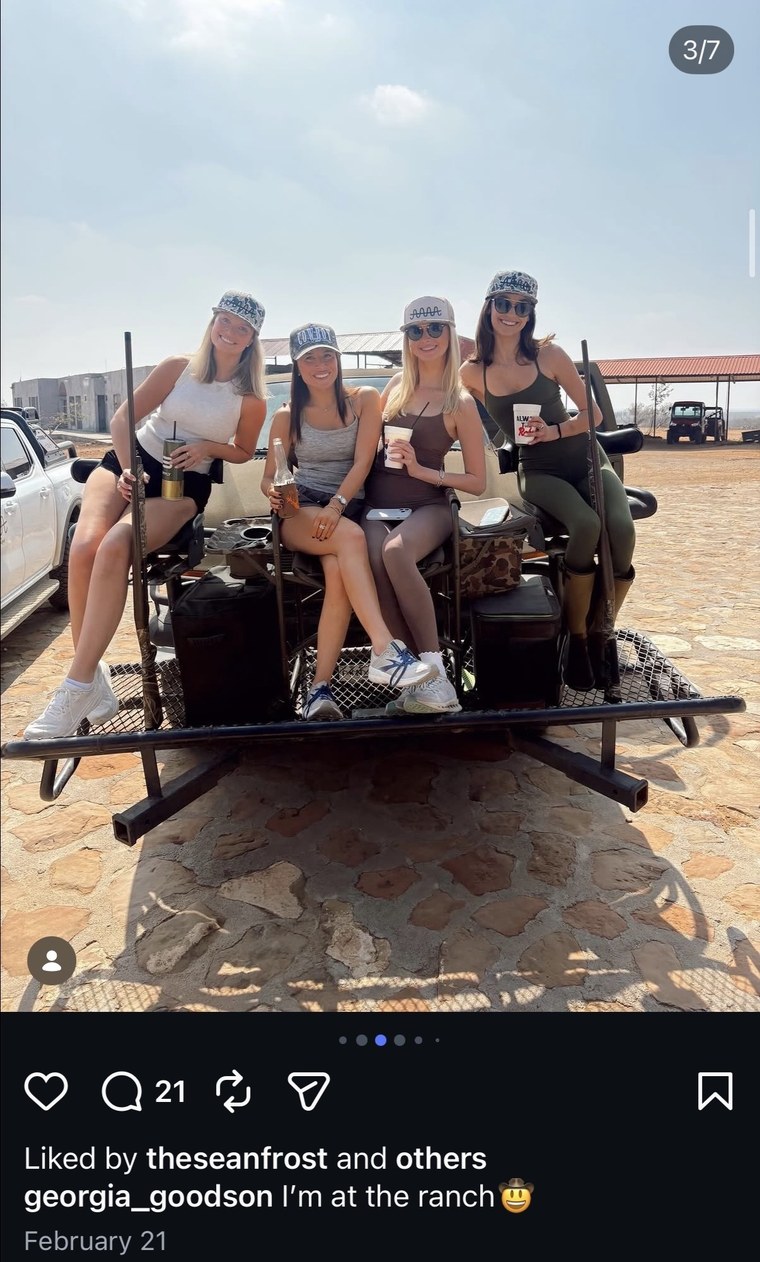 Friends riding the ranch buggy